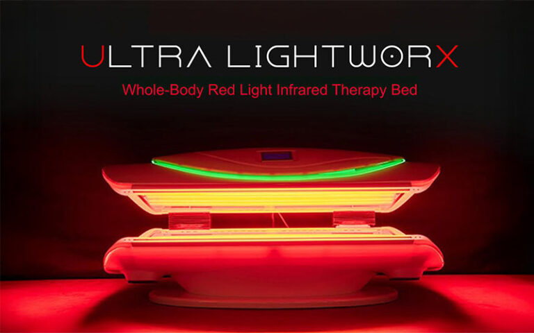 Ultra LightworX whole-body red light infrared therapy bed glowing red