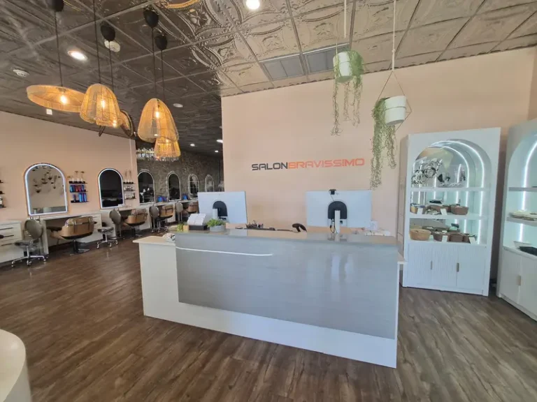Reception desk and hanging woven pendant lights at Salon Bravissimo in Folsom